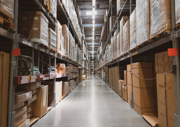 istock Shelve with boxes in modern factory warehouse. 1399189498