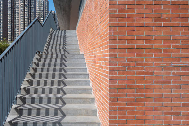 istock Red brick walls and cement ladders in sunny skies 1399189612