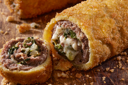 Beef Roulade Stuffed with Swiss Cheese, Spinach and Onions