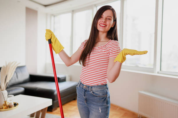 istock Woman mopping the floor at home 1399193891