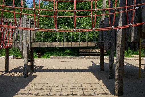 Wooden and rope climbing bridges in a playground