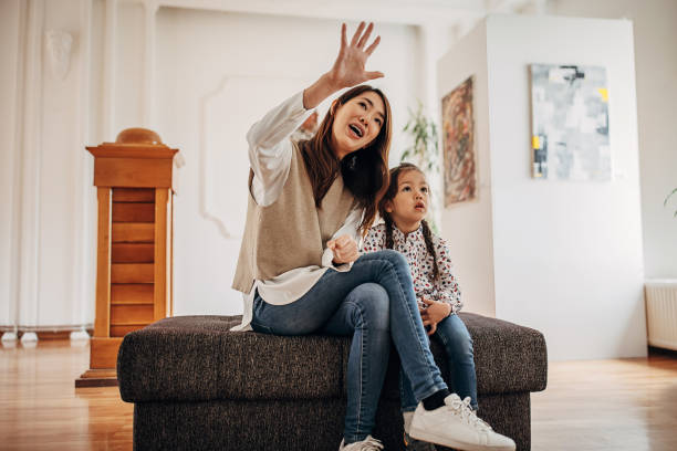 istock Mother and daughter in art gallery 1399194969