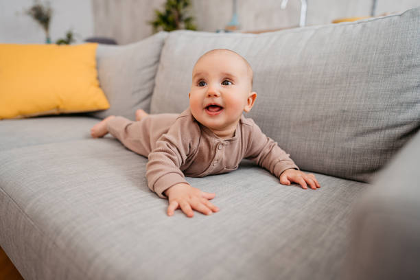 istock Newborn Baby Boy Lying On The Sofa 1399195275