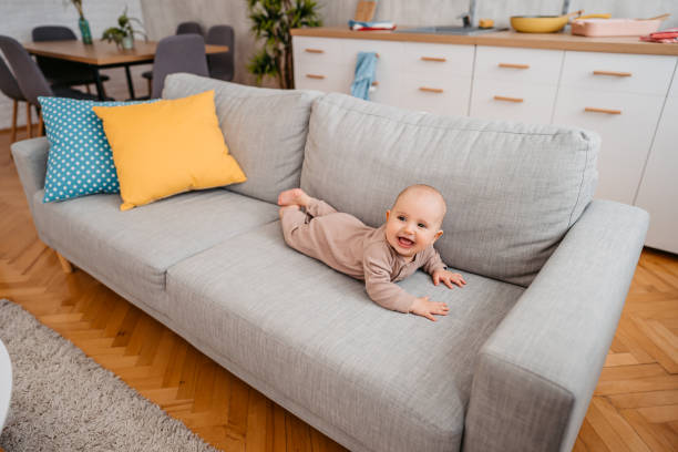 istock Newborn Baby Boy Lying On The Sofa 1399197124