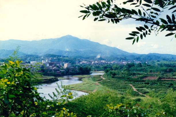 Mengla County in 1990s,China, on the border with Laos Mengla County in Xishuangbanna, Yunnan province, China, bordering Laos.Mengla was a very small town in the 1990s xishuangbanna stock pictures, royalty-free photos & images