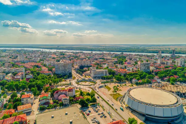 Photo of Wide aerial drone shot of roundabout and Danube river in city of Ruse, Bulgaria