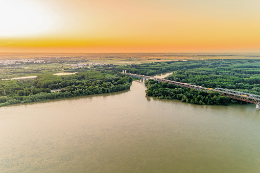 Aerial view of steel truss bridge over the Danube River - (Bulgarian: Дунав мост, Русе, България. River connecting Bulgarian and Romanian banks between Ruse and Giurgiu cities. The picture is taken with DJI Phantom 4 Pro drone / quadcopter