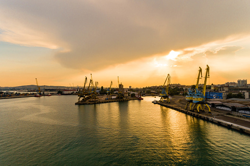 Wide aerial shot of harbor Burgas and Black Sea at sunset. golden hour. The picture is taken with DJI Phantom 4 Pro drone / quadcopter