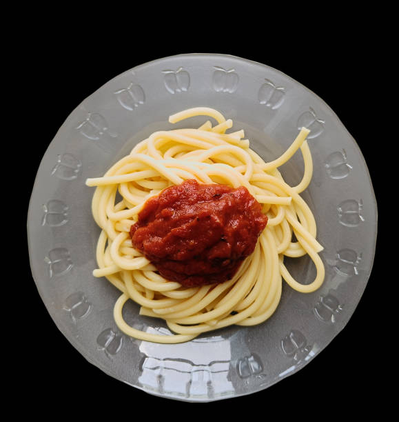 Spaghetti noodles tomato sauce on plate, Top view, with clipping path
