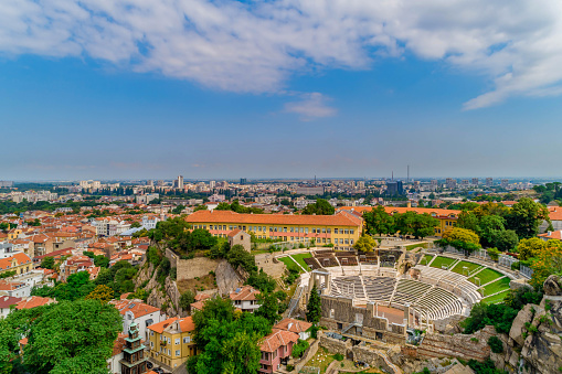 Aerial drone shot of Ancient Roman theatre, Plovdiv, Bulgaria - (Bulgarian: Римски античен театър Пловдив, България). Plovdiv Roman theatre is one of the world's best-preserved ancient Roman theatre, located in the city center of Plovdiv, Bulgaria. It was constructed in the 90s of the 1st century AD, probably during the reign of Emperor Domitian. The theatre can host between 5000 and 7000 spectators and it is currently in use. The picture is taken with DJI Phantom 4 Pro drone / quadcopter.