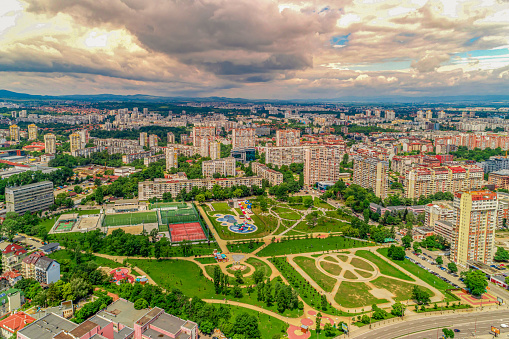 Wide aerial drone shot of  public park Vazrajdane ,  Sofia city, Bulgaria, (Bulgarian :парк Възраждане и комплекс Възраждане, София, България)