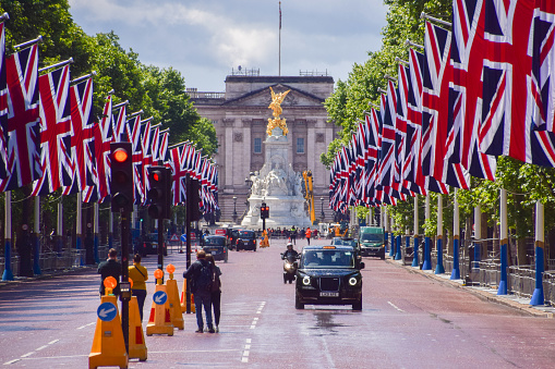 London, UK. May 24 2022. Union Jack flags in The Mall for the Queen's Platinum Jubilee, marking the 70th anniversary of the Queen's accession to the throne.