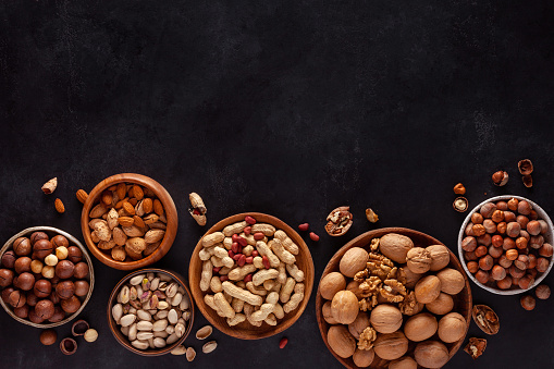 Close-up of various nuts in bowls