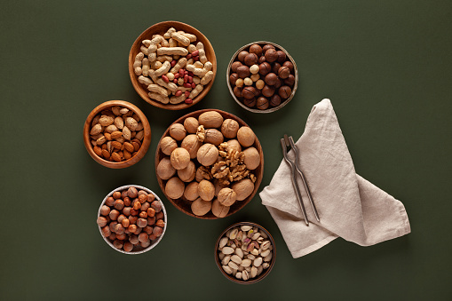 Close-up of various nuts in bowls