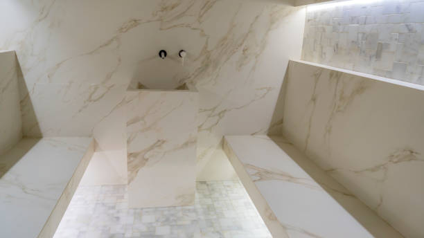 istock Classic turkish hammam. White turkish bath with marble surfaces. Marble oriental bathroom. Steam bath interior. 1399206141