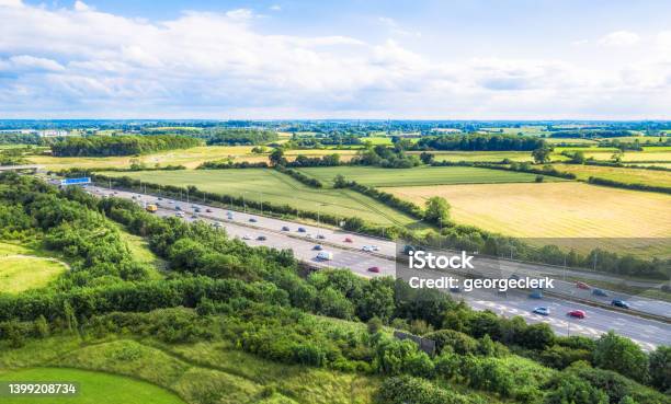 Traffic On The M1 Motorway In Summer Stock Photo - Download Image Now - UK, Car, Multiple Lane Highway