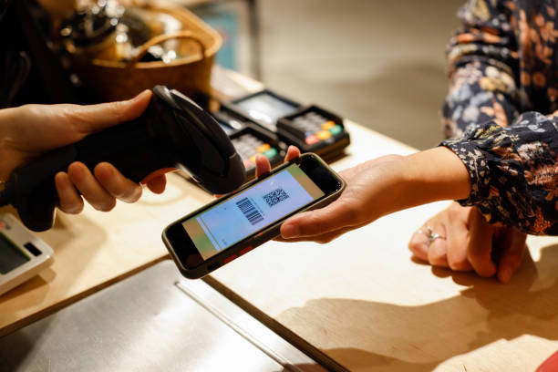 istock Lady checking out with digital payment at the counter 1399213340