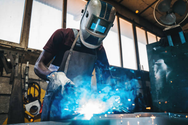 istock Industrial Welder With Torch 1399216064