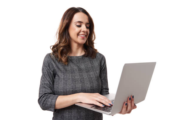 istock Businesswoman working on her laptop 1399217279