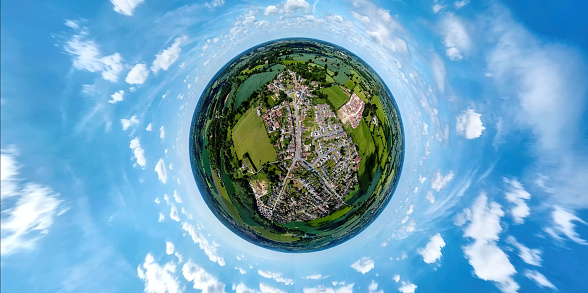 A tiny planet view from a drone of the village of Haughley in Suffolk, UK