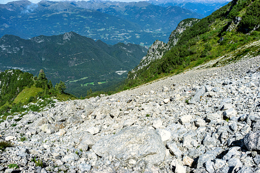 Stone scree - the consequences of a landslide in the mountains, top view