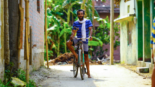 istock young villager man with bicycle farmer labor boy image 1399219515