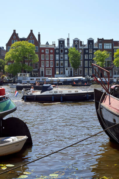istock Amsterdam canal houses and River Amstel 1399221645