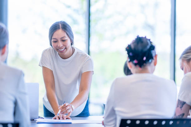istock Woman Leading a Meeting 1399223624