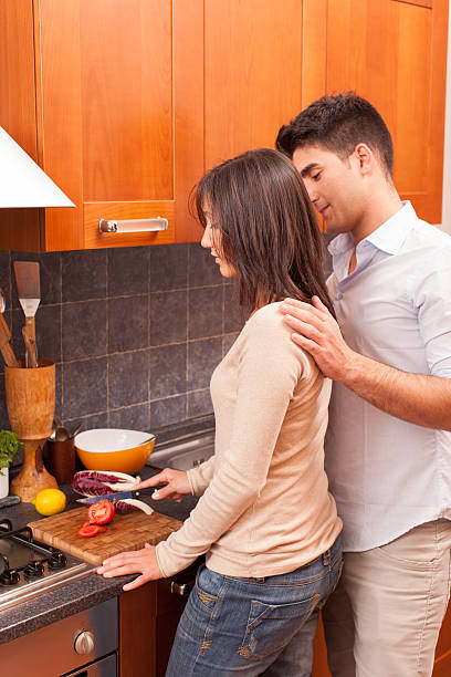 istock Happy Young Couple in the Kitchen 139922577