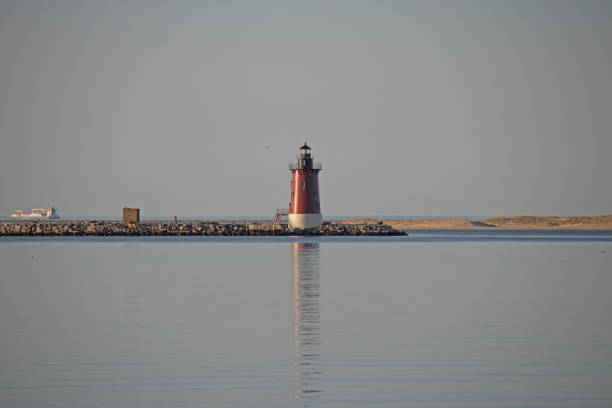 istock lighthouse in the port 1399226246