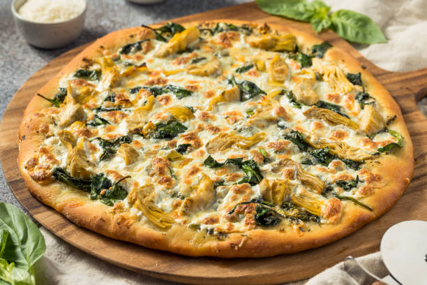 istock Homemade Italian Artichoke Spinach Pizza 1399228940