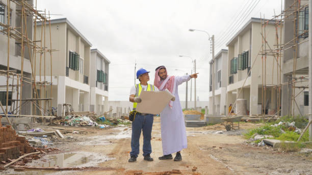 istock An arabian or muslim man, a designer architect working on industrial construction site at home architecture building project. People lifestyle. 1399229507