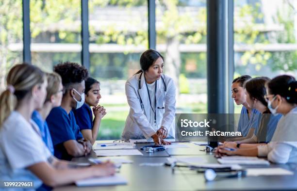 Medical Residence Team Meeting Stock Photo - Download Image Now - Medical Student, Medical School, Doctor