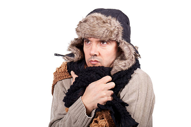 istock man with cold wearing a scarf and bonnet 139922993