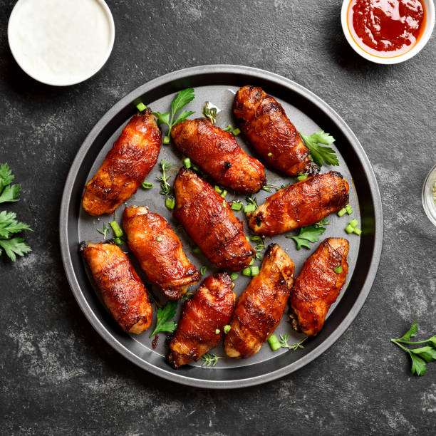 istock Bacon wrapped grilled chicken wings 1399233825