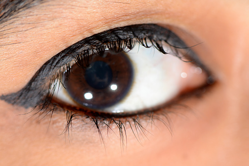 Beautiful brown human eye very close-up macro photography