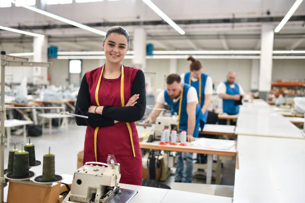 istock Smiling Female Textile Worker Showing Confidence On Workplace 1399238852