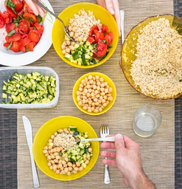 People eating a vegan meal stock photo