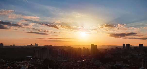 Sunset in the city with clouds. Ribeirao Preto City Skyline, famous city in Brazil.