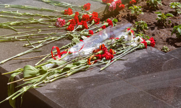istock Commemorative memorial. Laying flowers at the eternal fire. 1399249664