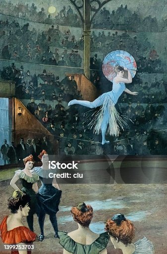 istock Female artist with a parasol dances on the tightrope 1399253703