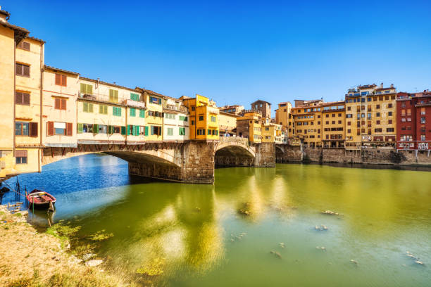 istock Ponte Vecchio Bridge during Beautiful Sunny Day with Reflection in Arno River, Florence 1399255037
