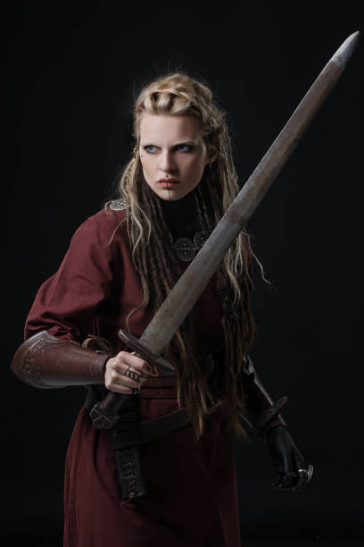 istock Weapon wielding Russian viking warrior queen in studio shot 1399257053