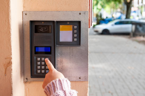 istock Hand pushing key of the modern digital intercom with numeric keypad and passcard sensor 1399257254