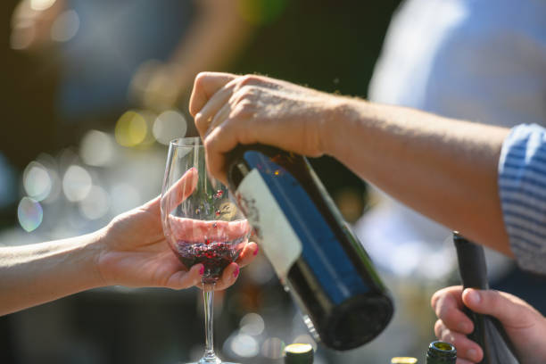 istock Pouring wine in wineglass 1399258361