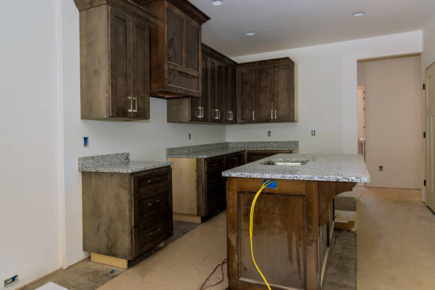 istock Kitchen furniture set installation in hanging cabinet 1399266535