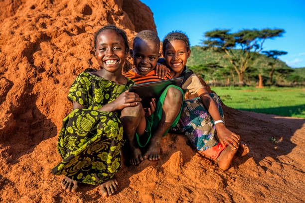 istock African children using a digital tablet, East Africa 1399267577