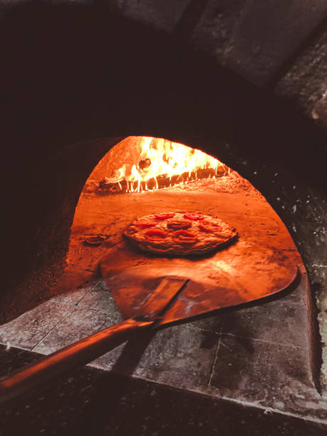 istock Mozzarella pizza baked in a wood-fired oven. Pizzeria. 1399267934