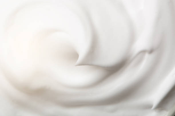 sfondo color crema - yogurt foto e immagini stock