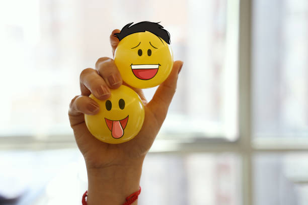 Woman holding emoji